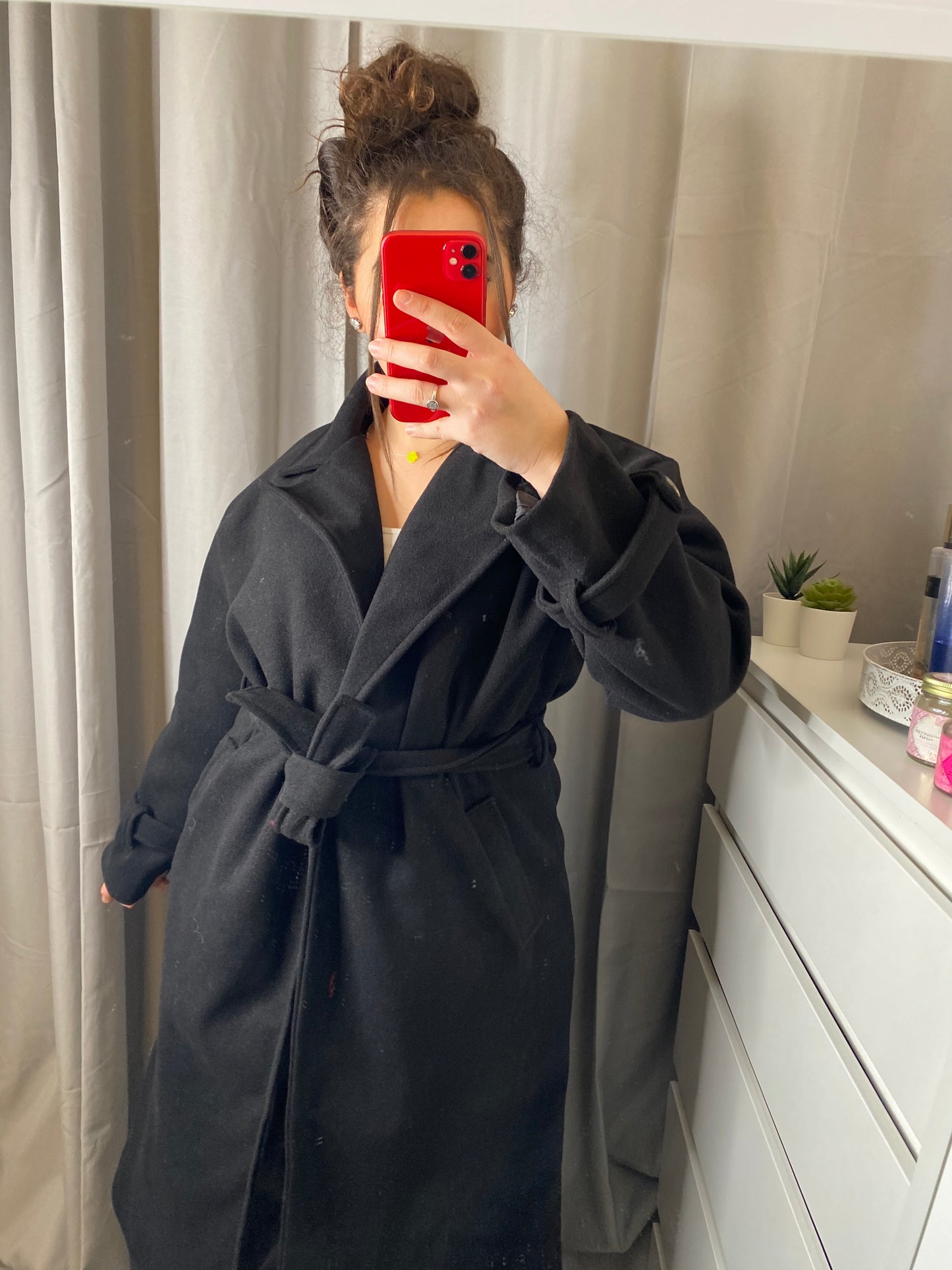 Manteau à noeud noir
